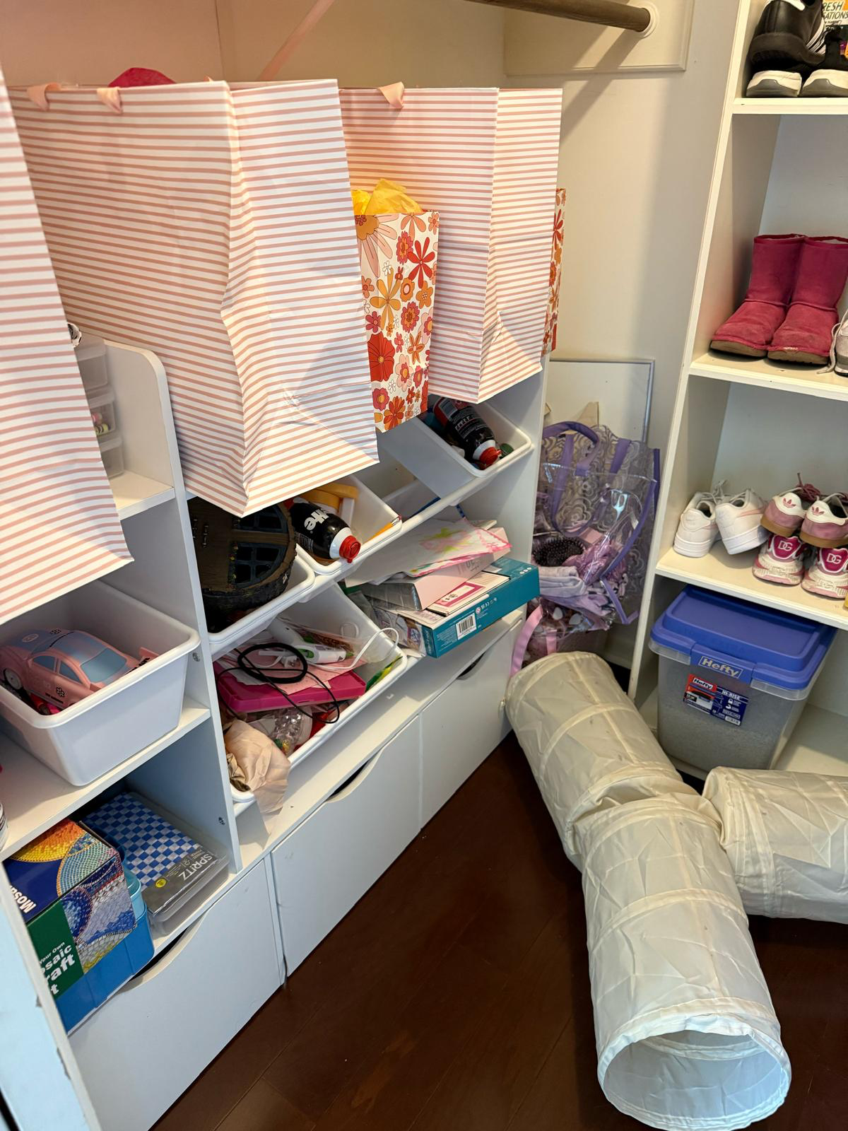 Before organizing: A closet that feels lighter